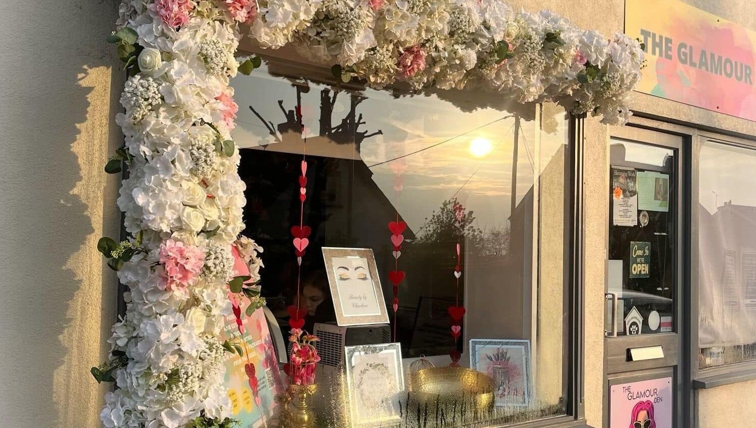Neat Feet entrance adorned with flowers, Burnham-on-Crouch, England, GB.