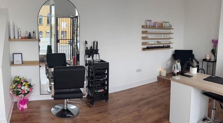 C-Perfect Beauty salon interior with styling chairs and shelves, Shipley, England, GB.