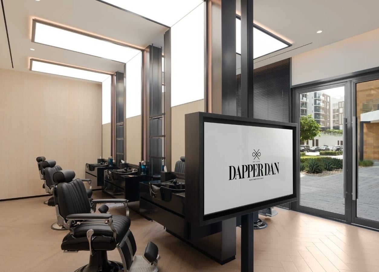 Interior of Dapper Dan Barbershop in Dubai, Dubai, AE showcasing sleek barber chairs and modern design.
