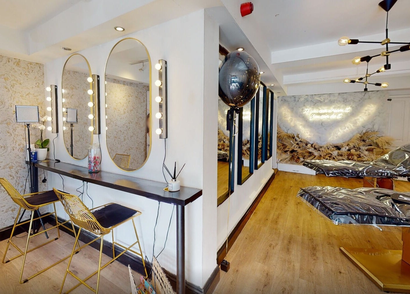 Chic treatment area at Mi Amor Aesthetics, Derby, England, GB showcasing modern decor and amenities.