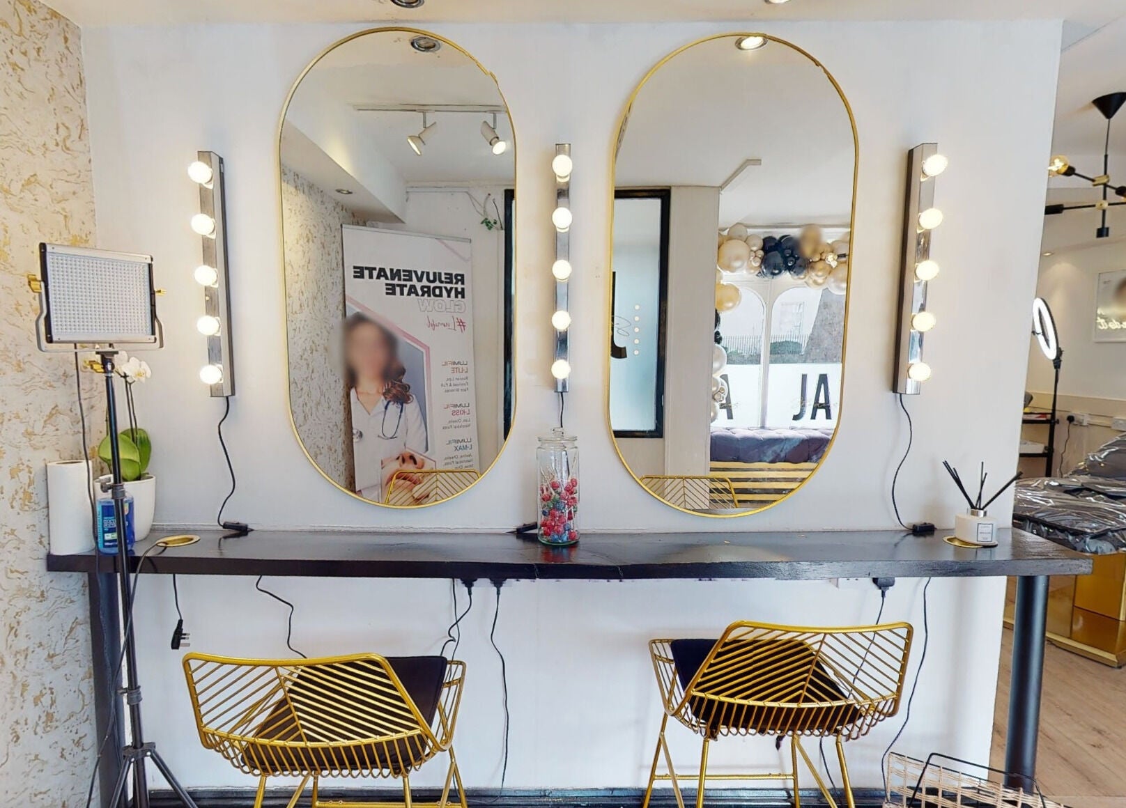 Stylish interior of Mi Amor Aesthetics in Derby, England, GB, featuring elegant mirrors and chic decor.