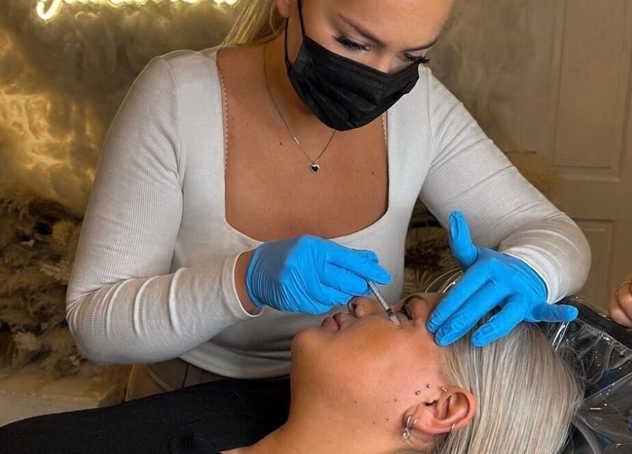 Expert performing beauty treatment at Mi Amor Aesthetics, Derby, England, GB.