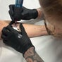 Halo Fine Line Ink inside Jodie’s Piercings
