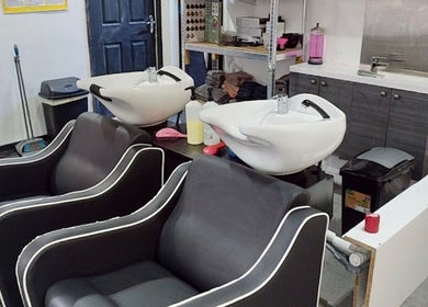 Comfortable salon chairs and sinks at Zaira-Rose, Perivale, England, GB, offering a relaxing experience.