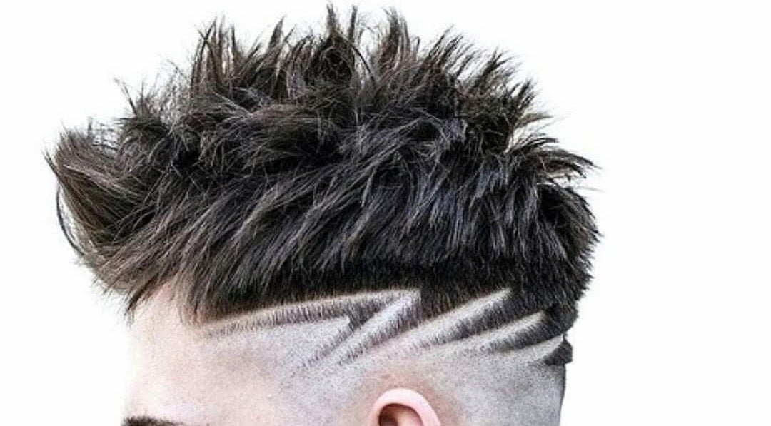 Trendy haircut with intricate design at Bazz Hair Zone, Delta, British Columbia, CA.