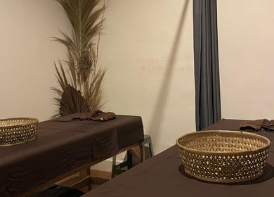 Serene massage room at Khonó Spa, Bali, Bali, ID with elegant decor and soothing ambiance.
