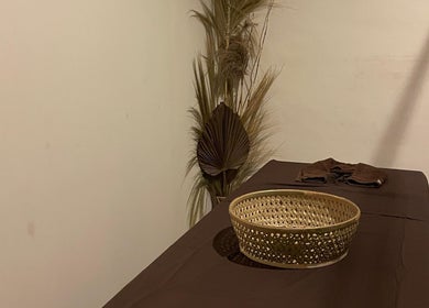 Relaxing massage table with decor at Khonó Spa, Bali, Bali, ID.
