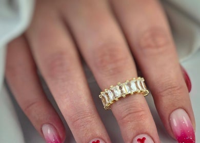 Elegant nail art with hearts at SWorld Nails, Kingston Upon Hull, Anglia, GB, showcasing chic and trendy designs.