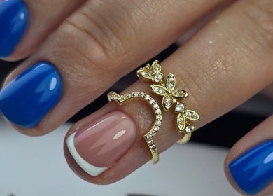 Blue and French manicure with gold ring at SWorld Nails, Kingston Upon Hull, Anglia, GB.