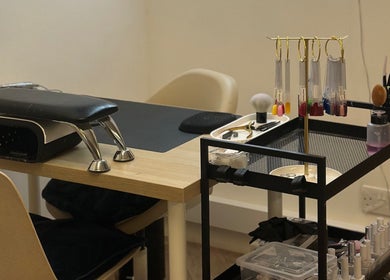 Nail station at Serenity Beauty & Hair Salon in Lerwick, Scotland, GB, with polish and tools for a perfect manicure.