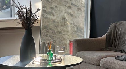Cozy lounge area at Serenity Beauty & Hair Salon in Lerwick, Scotland, GB with soft seating and elegant decor.