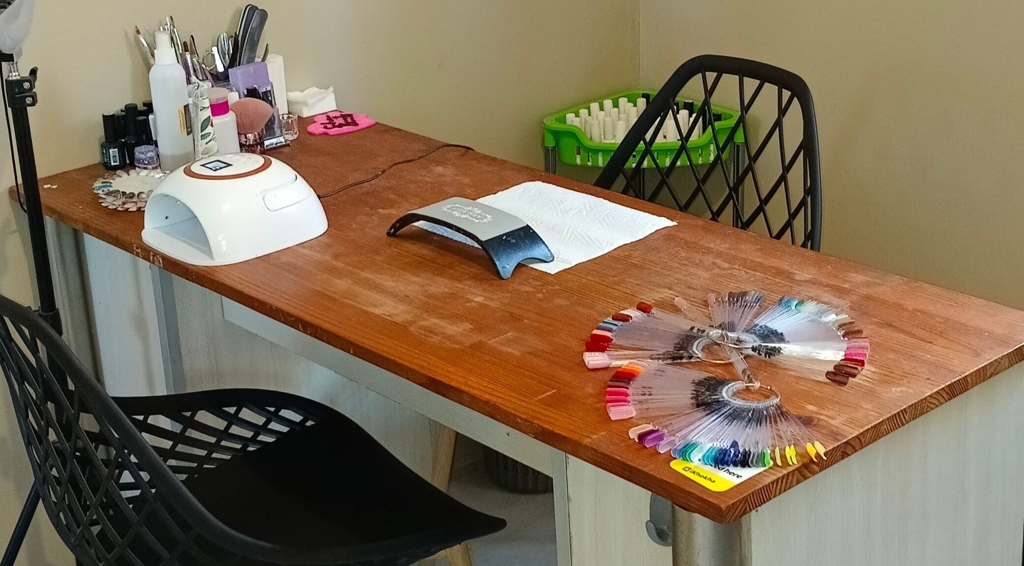 Sakura Beauty by Tarryn's manicure station in East London, Eastern Cape, ZA showcases nail polish colors.