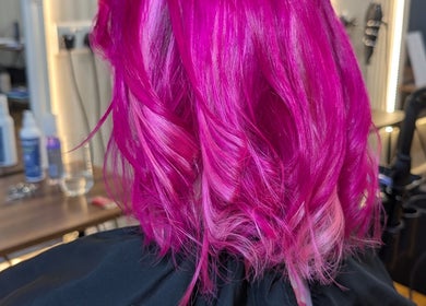 Bright pink hairstyle at Twisted Friction @ Strands Studio, Sheffield, England, GB.