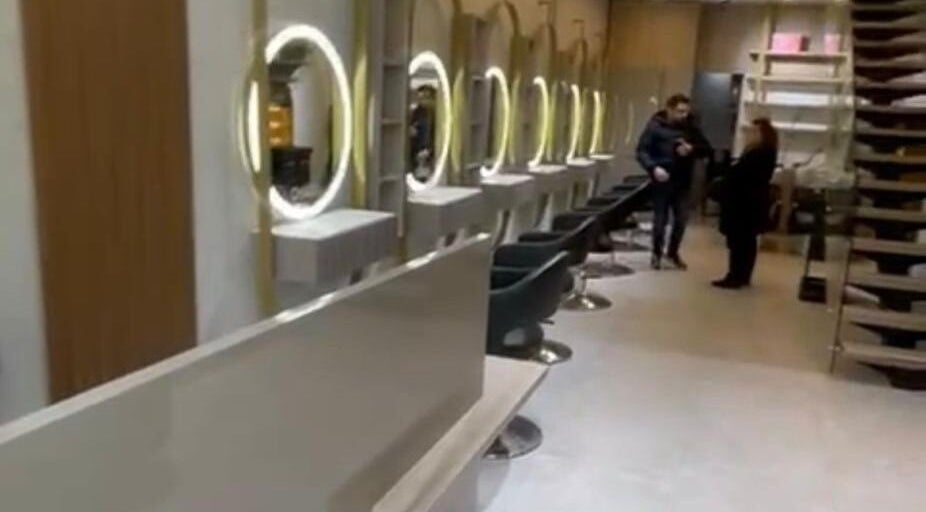 Elegant beauty stations at Salon Charles Malek, Naqqache, Jabal Lubnan, LB with modern circle mirrors.