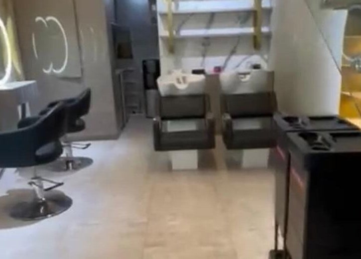 Modern interior of Salon Charles Malek in Naqqache, Jabal Lubnan, LB, featuring stylish chairs and wash basins.