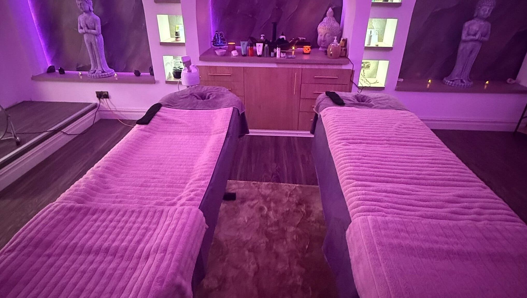 Relaxing massage setup at Eden Hair & Beauty in Heywood, England, GB with cozy lighting and decor.