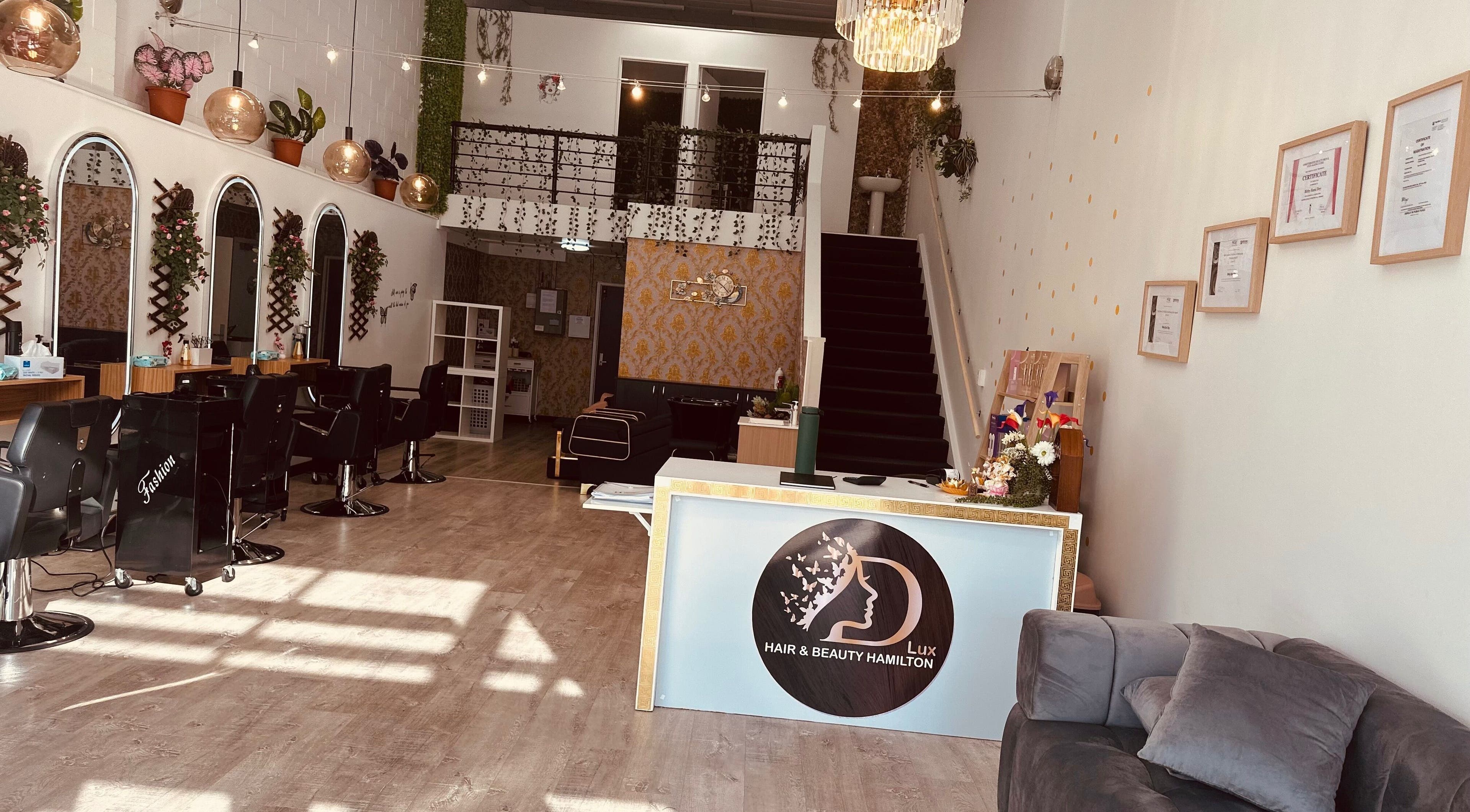 Elegant interior of D'LUX Hair & Beauty Hamilton in Hamilton, Waikato, NZ showcasing stylish decor and seating.