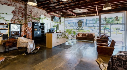 Cozy interior of Blade Cartel Barber and Aesthetics, Bunbury, Western Australia, AU featuring rustic décor.
