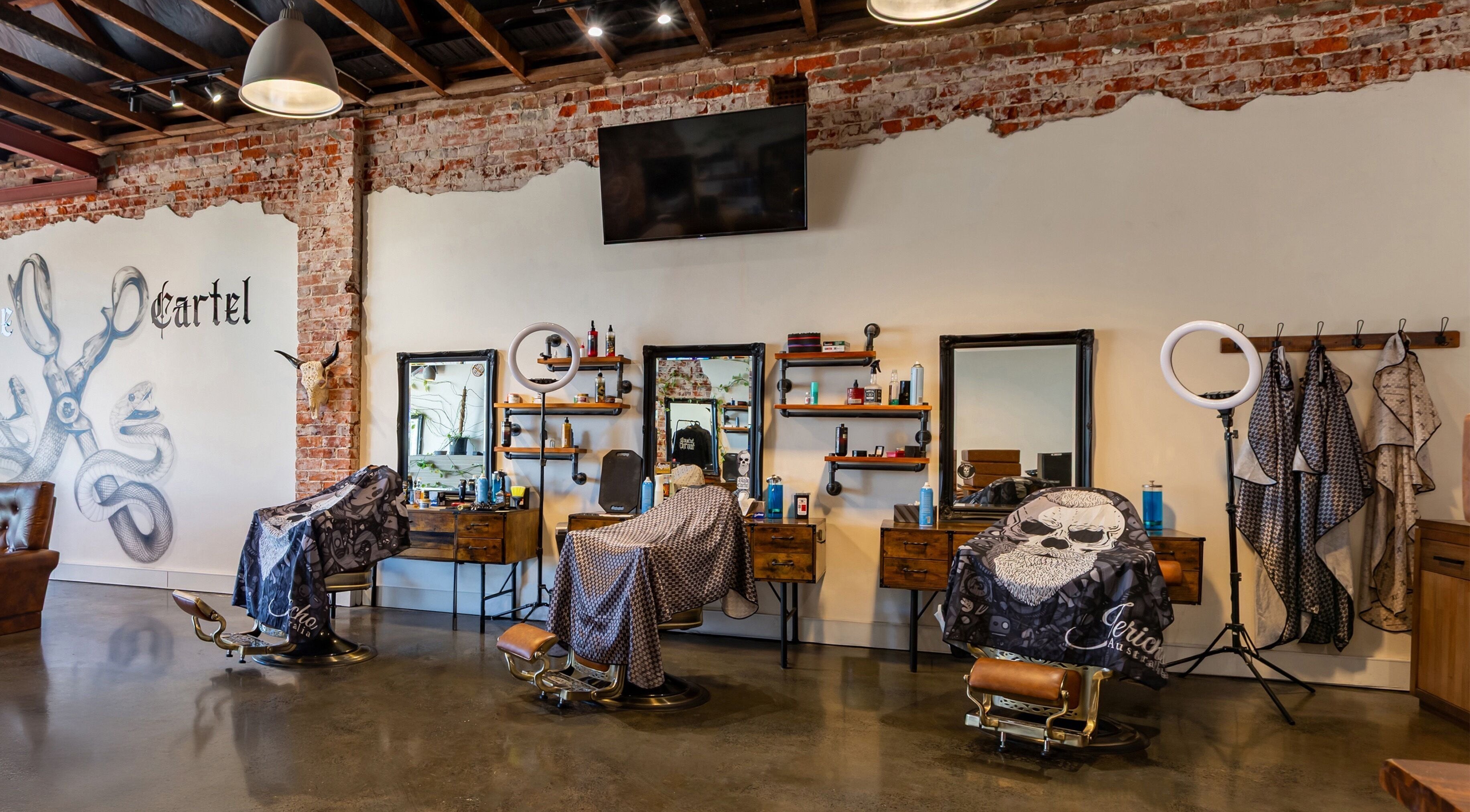 Interior of Blade Cartel Barber, Bunbury, Western Australia, AU showcasing stylish barber chairs and decor.