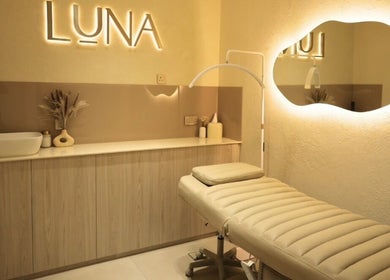 Serene treatment room at Luna Beauty Bar, Dubai, Dubai, AE, featuring a plush bed and soft lighting.