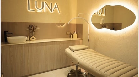 Serene treatment room at Luna Beauty Bar, Dubai, Dubai, AE, featuring a plush bed and soft lighting.