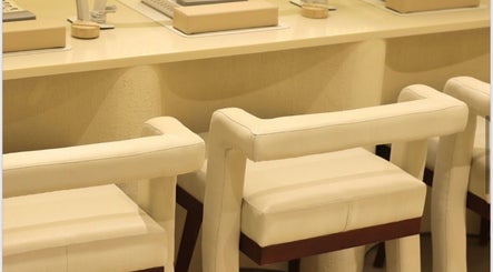 Elegant manicure station at Luna Beauty Bar, luxurious seating, Dubai, Dubai, AE.
