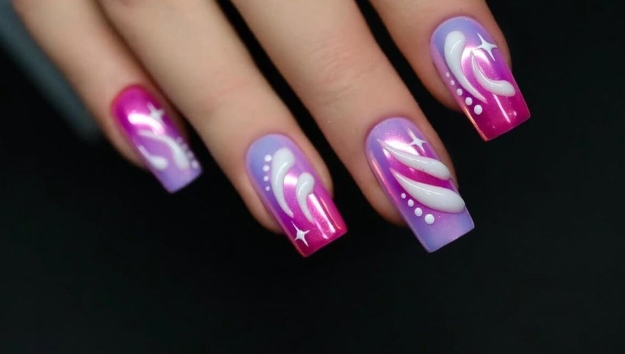 Vibrant purple and pink nail art at Shape Nails, Medford, Massachusetts, US showcasing intricate designs.