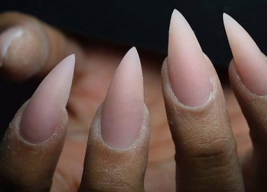 Close-up of elegant, sharp almond-shaped nails at Shape Nails, Medford, Massachusetts, US.