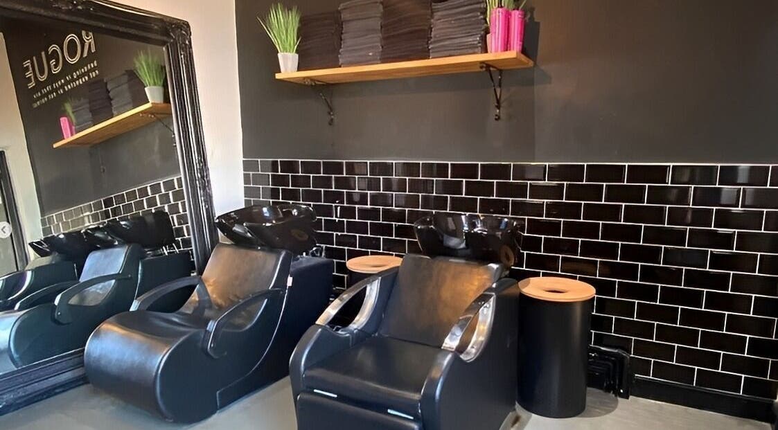 Stylish salon wash stations at Simply Rogue, Darlington, England, GB showcasing modern black design.
