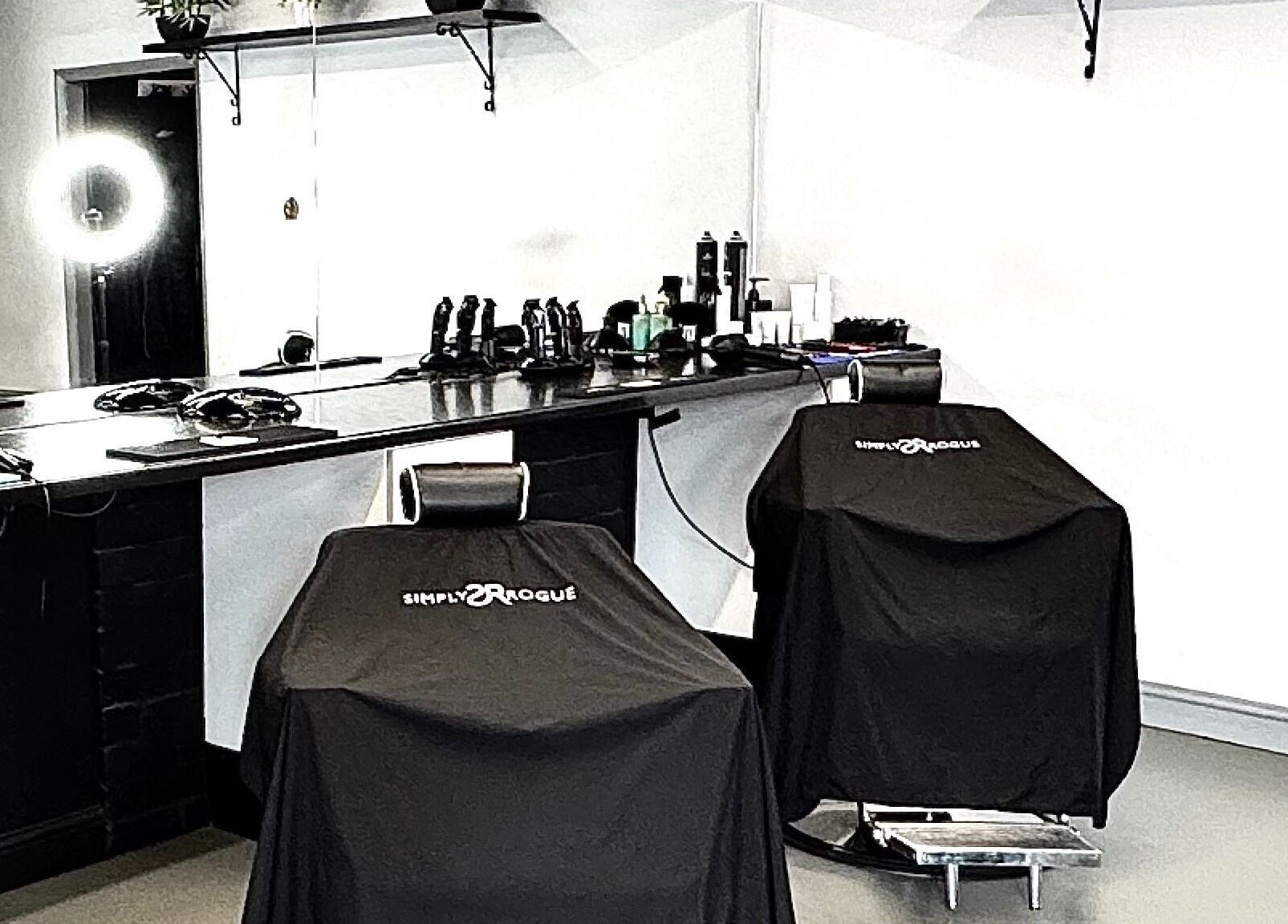 Modern beauty salon setup at Simply Rogue, Darlington, England, GB with chic styling chairs and equipment.