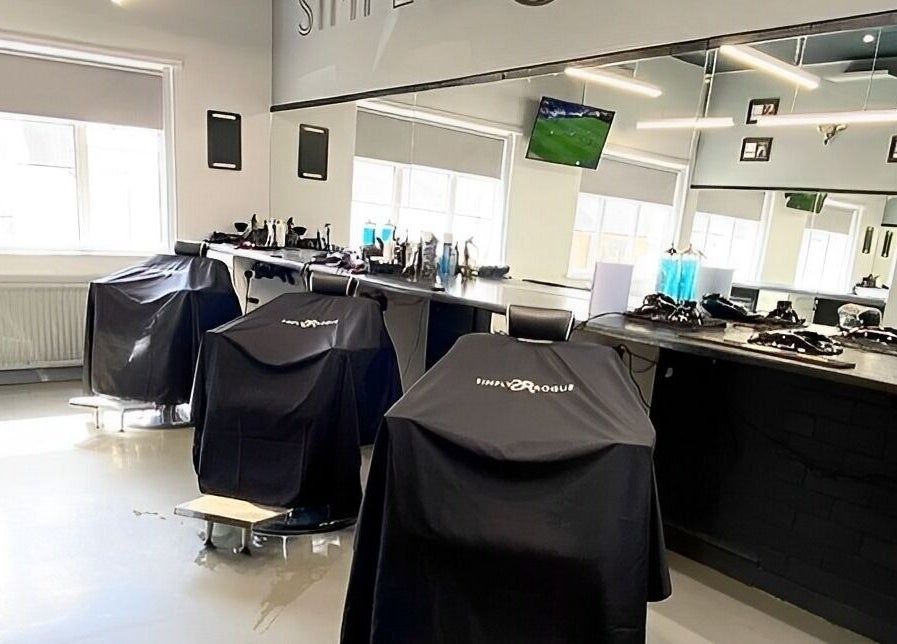 Modern salon chairs and mirrors at Simply Rogue in Darlington, England, GB.