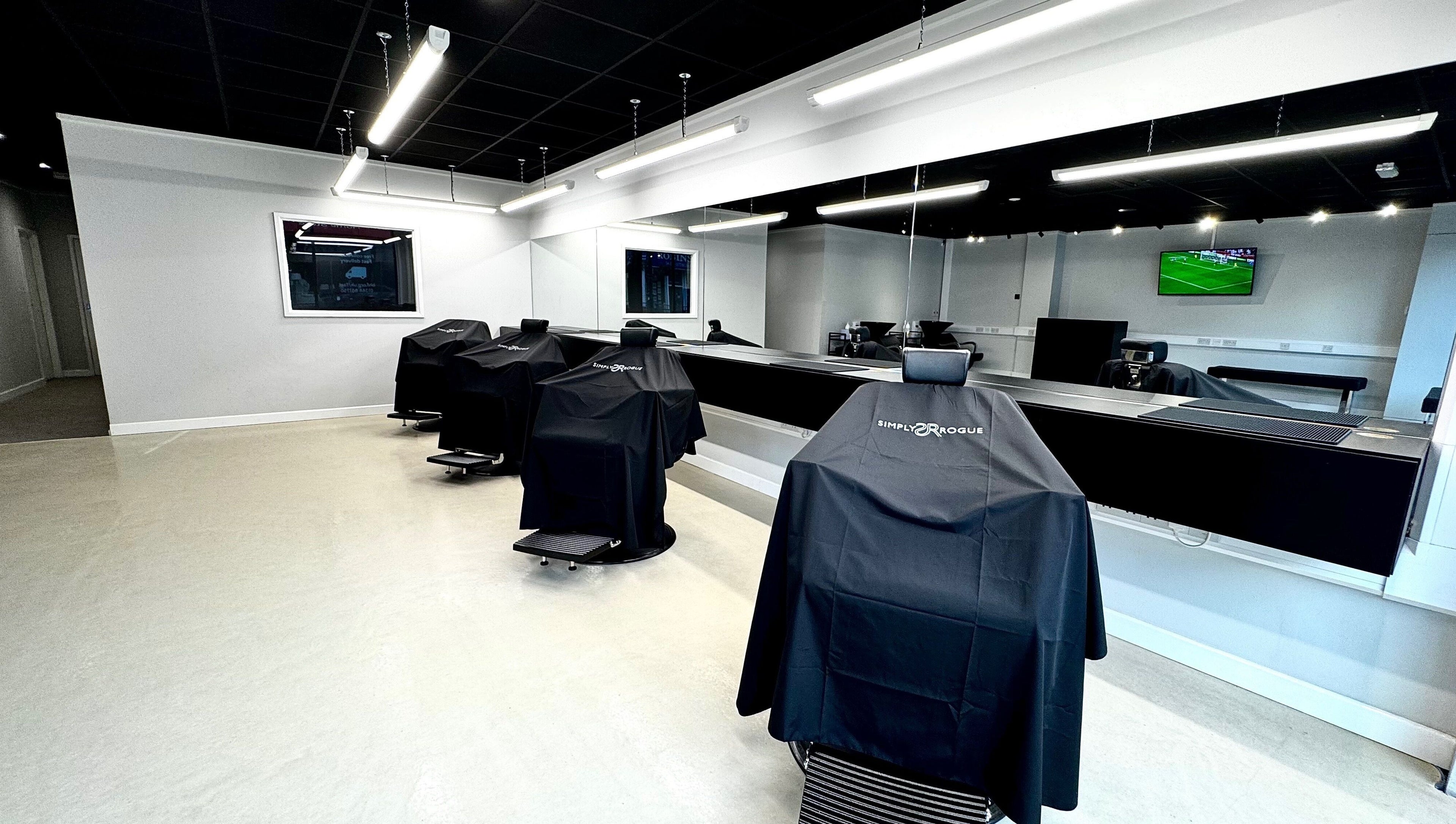 Modern salon chairs at Simply Rogue Bishop Auckland in a sleek setting, Bishop Auckland, England, GB.