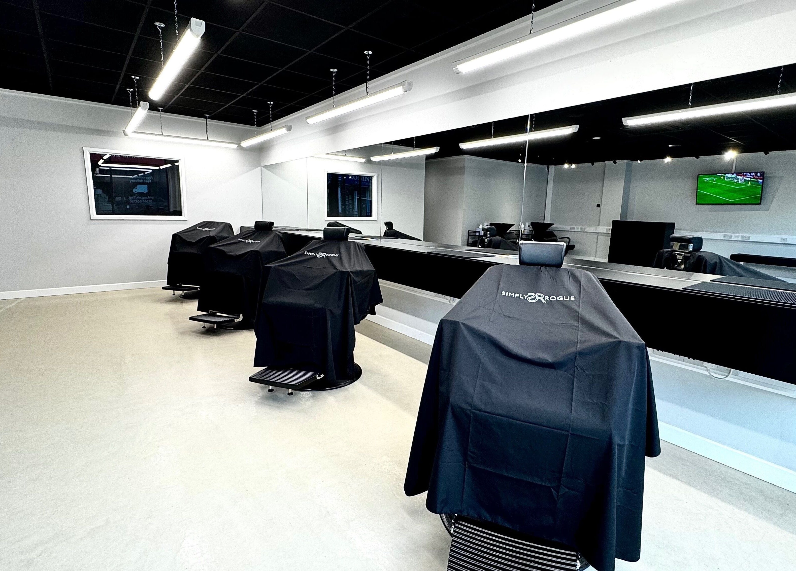 Modern salon chairs at Simply Rogue Bishop Auckland in a sleek setting, Bishop Auckland, England, GB.