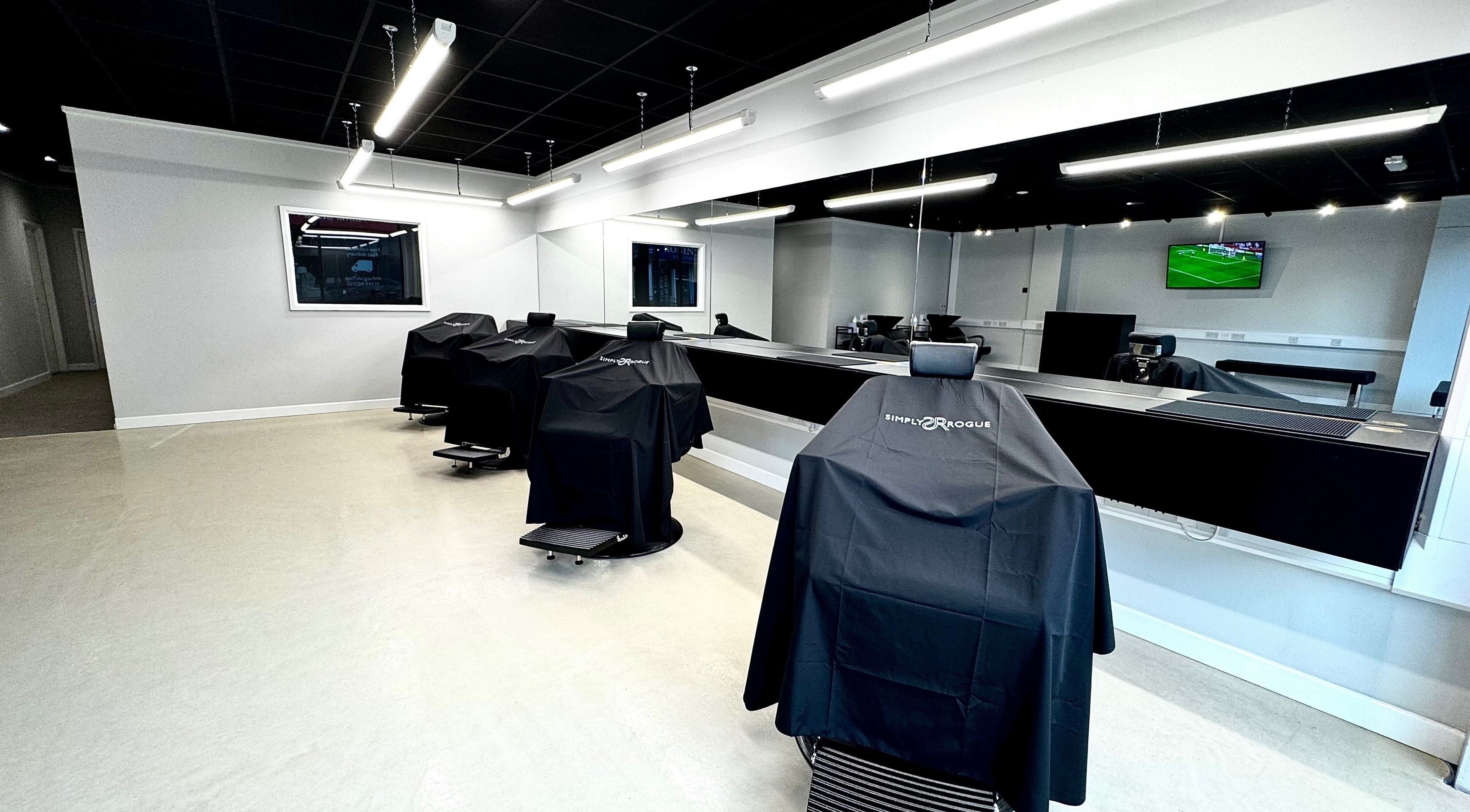 Modern salon chairs at Simply Rogue Bishop Auckland in a sleek setting, Bishop Auckland, England, GB.