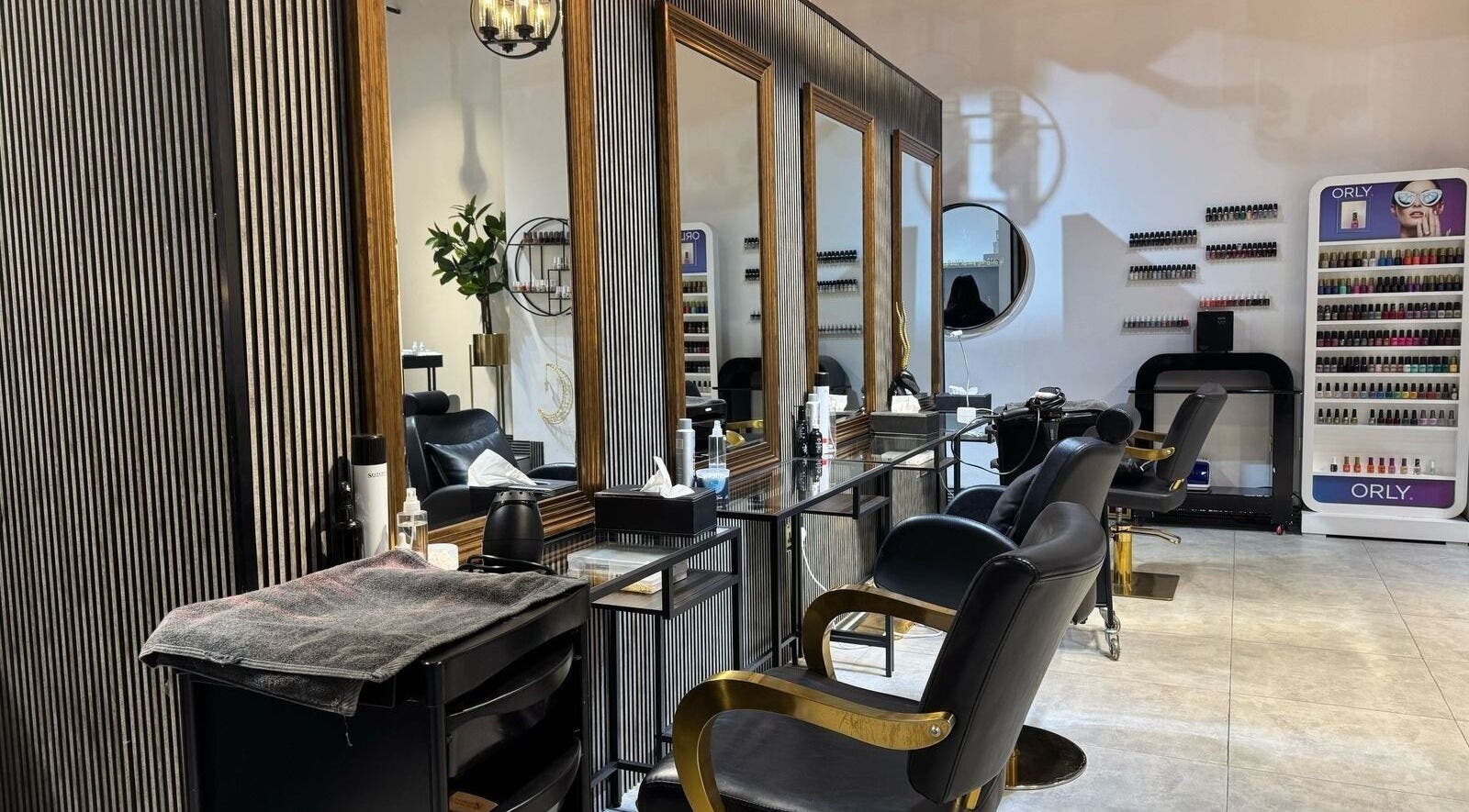 Luxurious salon space at The Saba Beauty Saloon, Abu Dhabi, AE, featuring stylish mirrors and comfortable chairs.