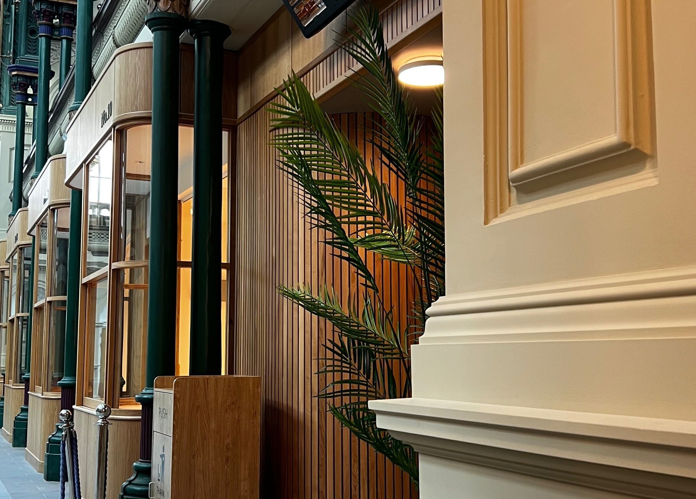 Classically styled atrium at Klsandco, Doncaster, England, GB featuring tall columns and large windows.