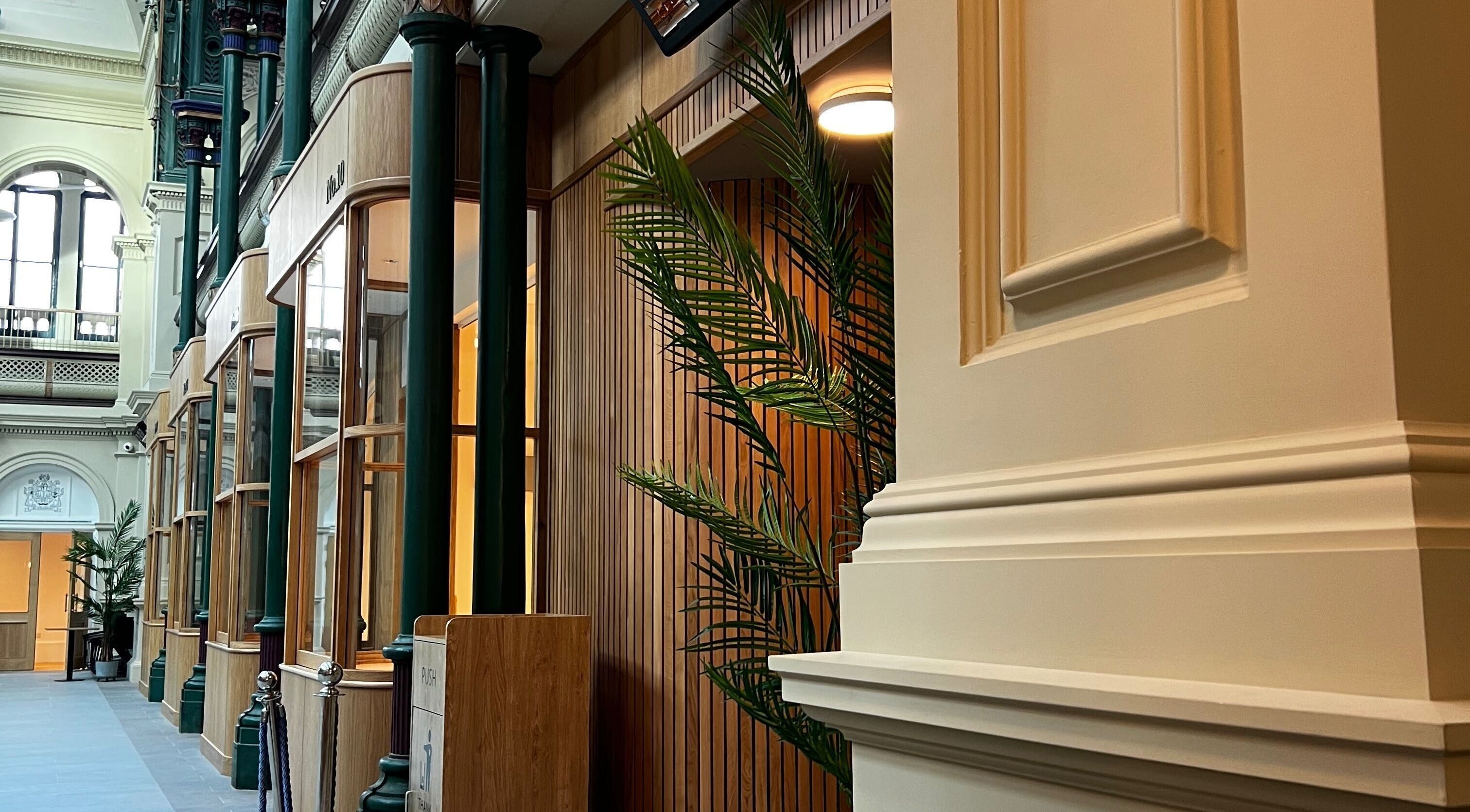 Classically styled atrium at Klsandco, Doncaster, England, GB featuring tall columns and large windows.