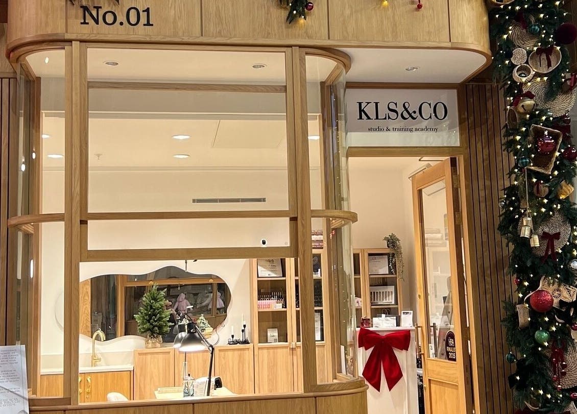 Klsandco beauty studio, Doncaster, England, GB, decorated for the holidays with festive wreaths and lights.