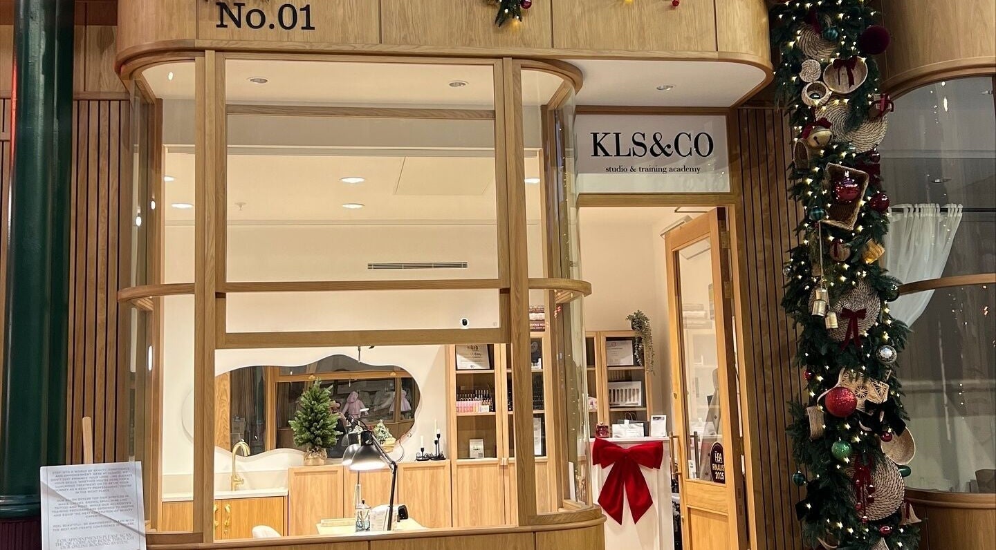 Klsandco beauty studio, Doncaster, England, GB, decorated for the holidays with festive wreaths and lights.