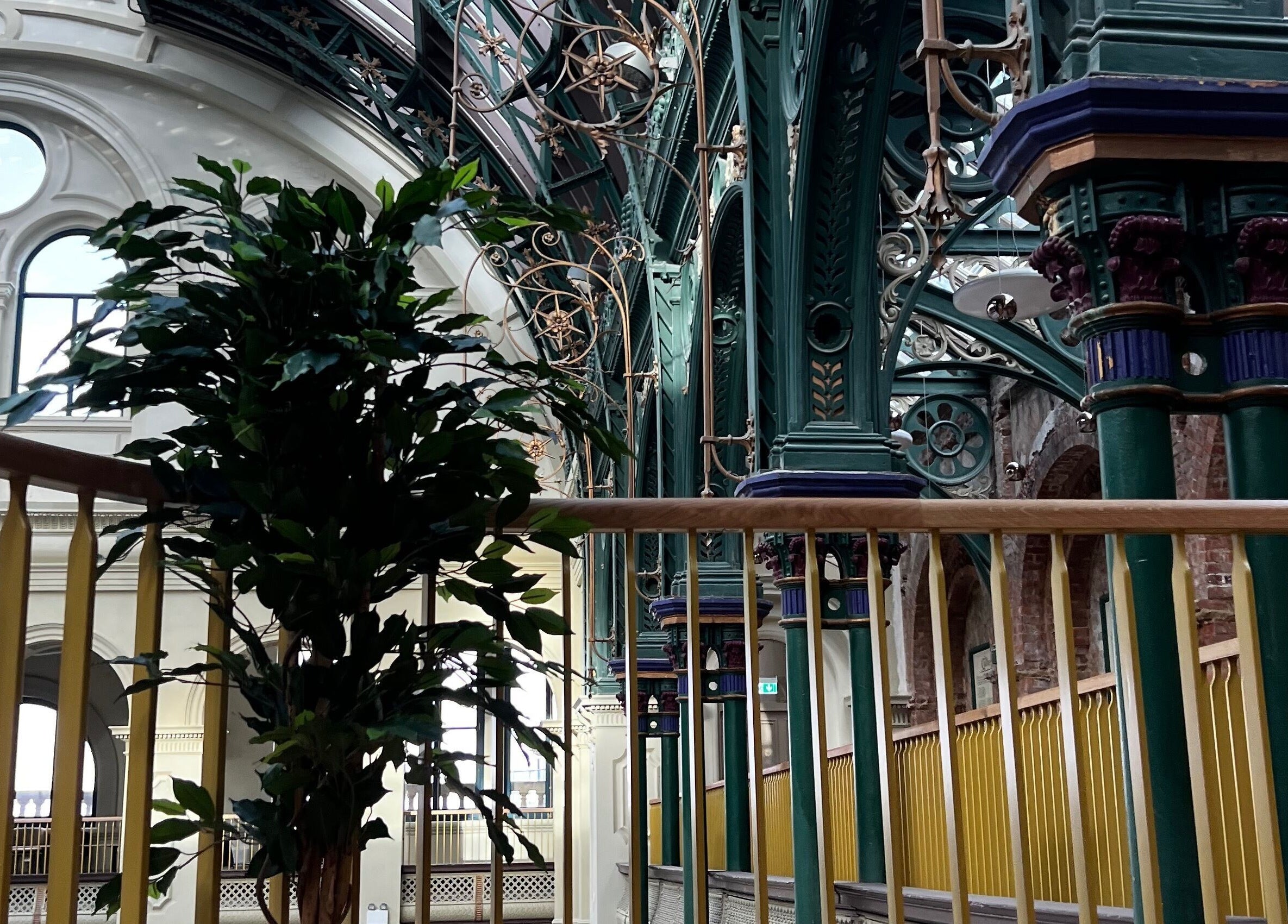 Intricate architecture at Klsandco, Doncaster, England, GB showcasing ironwork and greenery.