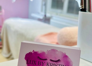 Lux by Kristina, Cheltenham, England, GB, features a stylish beauty room with pink decor and beauty products.