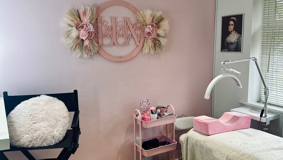 Lux by Kristina beauty corner in Cheltenham, England, GB with elegant decor and treatment setup.