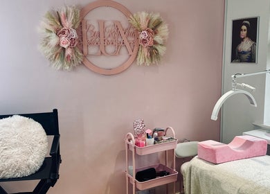 Lux by Kristina beauty corner in Cheltenham, England, GB with elegant decor and treatment setup.