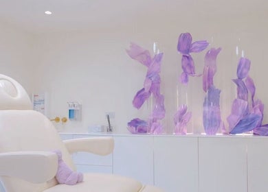 Luxury spa chair and floral decor at Ethereal Aesthetics, London, England, GB.