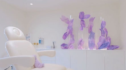 Luxury spa chair and floral decor at Ethereal Aesthetics, London, England, GB.