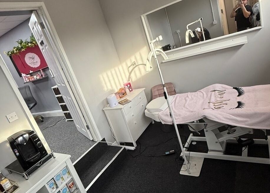 Relaxing beauty room at Nailed It By Jemma, Kingswinford, England, GB, featuring a treatment bed and décor.