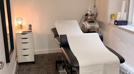 Treatment room at Seventeen Physiotherapy Clinic, London, England, GB, featuring a padded therapy table.