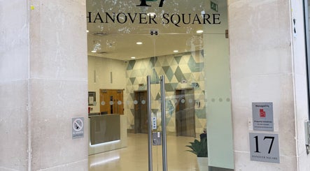 Entrance of Seventeen Physiotherapy Clinic in London, England, GB with modern glass doors.