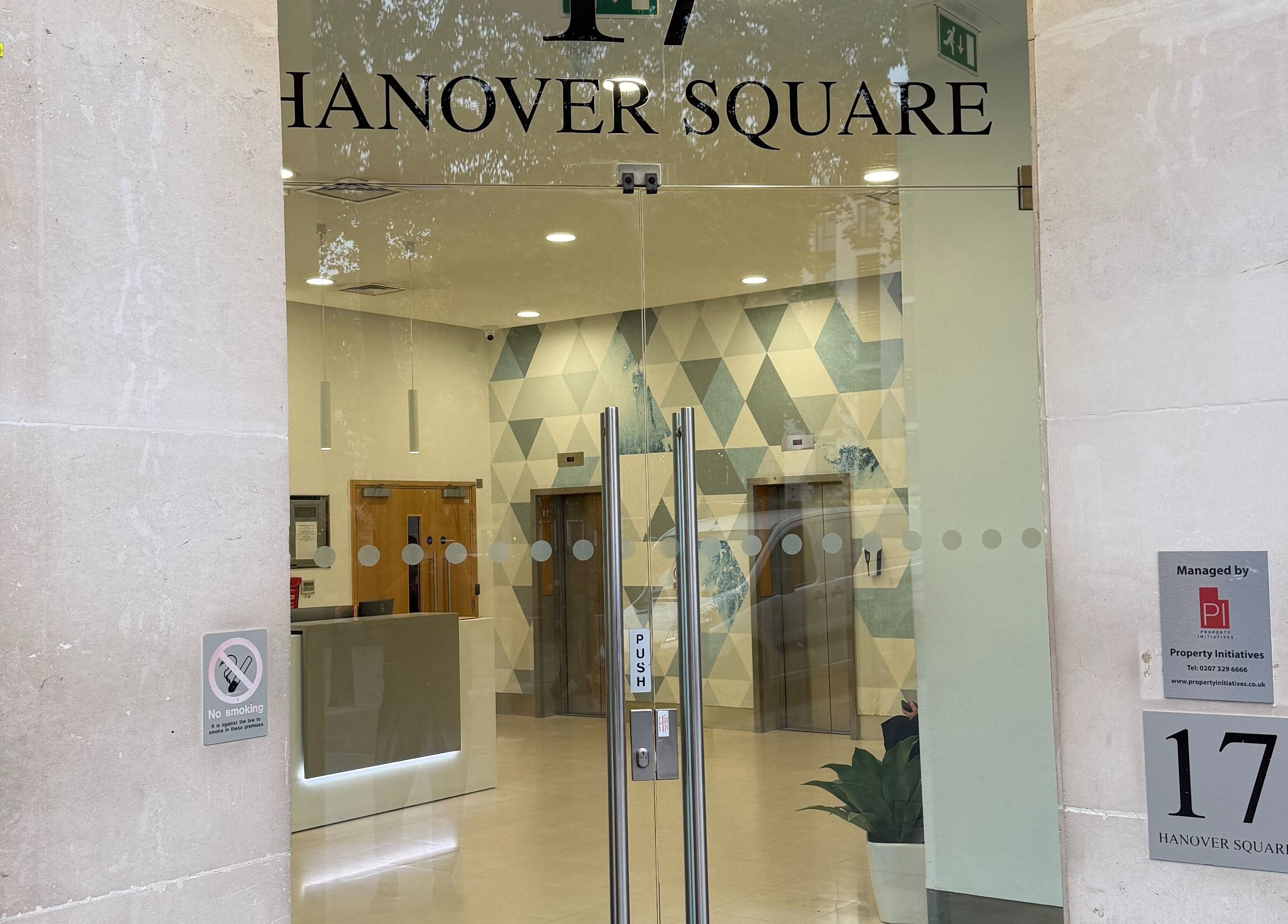 Entrance to Seventeen Physiotherapy Clinic in London, England, GB with glass doors and modern decor.