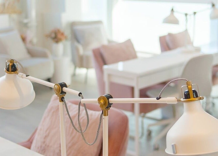 Bright, elegant nail salon at JJ Fantasy World in Richmond, British Columbia, CA with stylish lamps and chic decor.